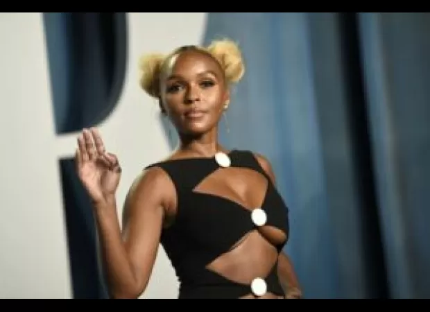 Janelle Monáe bared her chest during an Essence Festival performance, making a powerful statement.