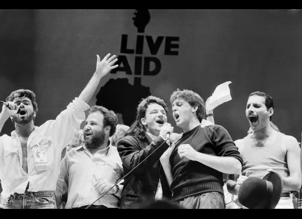 Iconic Live Aid sign thrown out as trash is worth thousands on Antiques Roadshow.