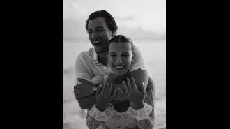 Millie Bobby Brown stuns in bridal white bikini and her fiancé Jake Bongiovi is loving it.