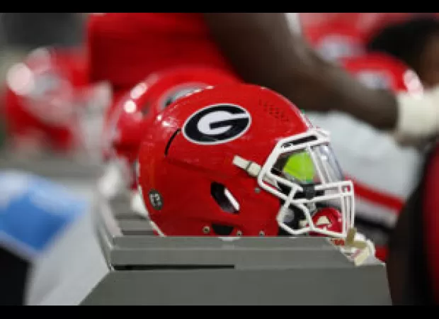 Former UGA staffer files lawsuit against school and NFL rookie Carter for alleged misconduct.