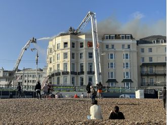 Fire breaks out at hotel in Brighton; residents urged to stay away.