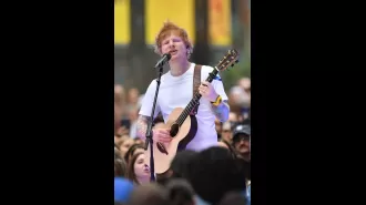 Crowd goes wild as Ed Sheeran and Eminem perform surprise duet.