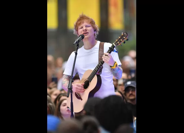 Crowd goes wild as Ed Sheeran and Eminem perform surprise duet.