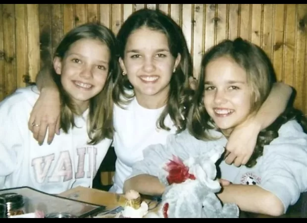 Mum reunited with her triplets after only being able to keep one.