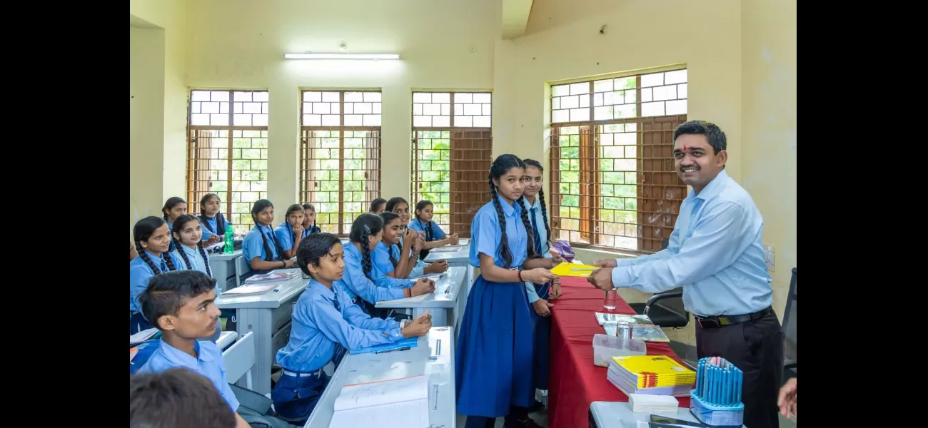 Collector Mishra taught students in a school in Madhya Pradesh.