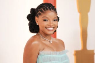 Halle Bailey shows solidarity with Latina actress facing racism after being cast as Snow White.