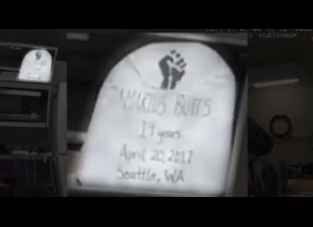 Police mocked a teen who was slain by displaying a fake tombstone of him in the break room.