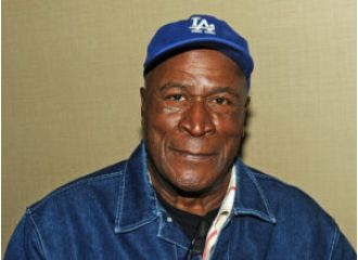 John Amos' son arrested for sending threatening messages to sister amid elder abuse allegations.