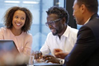 Black investment firm to become larger player in gov't IT services through new deal.