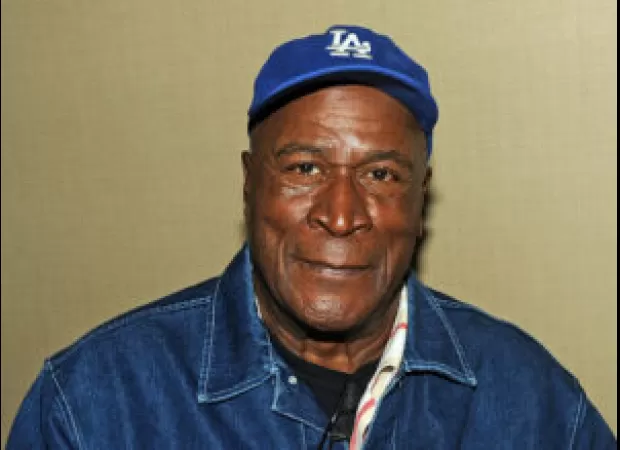 John Amos' son arrested for sending threatening messages to sister amid elder abuse allegations.