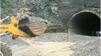 Highway closed due to heavy rains and landslide, no traffic allowed.