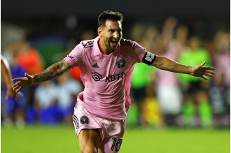 Messi celebrates scoring an amazing goal in his first game with Inter Miami.