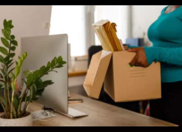 Faculty member fired allegedly for not fitting a certain racial stereotype.