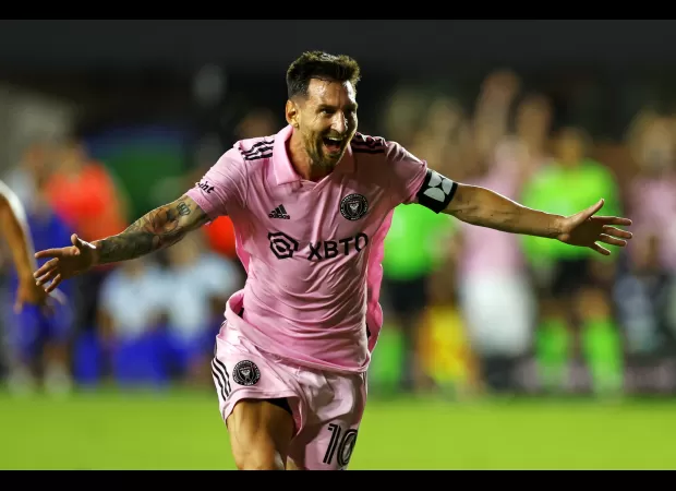 Messi celebrates scoring an amazing goal in his first game with Inter Miami.