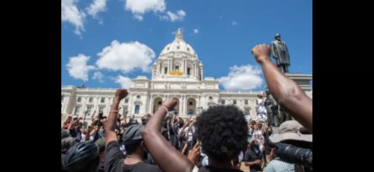 Charges dropped against white woman who spat on Black Lives Matter protestor.