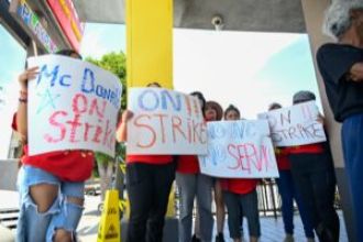 McDonald's employees strike to protest poor working conditions.