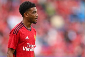 Amad Diallo exits stadium on crutches after Man Utd's victory over Arsenal in friendly.