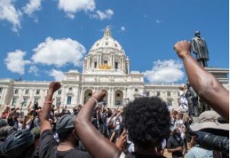 Charges dropped against white woman who spat on Black Lives Matter protestor.