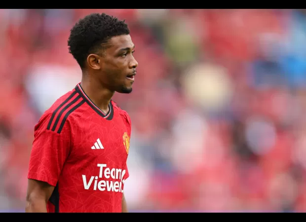 Amad Diallo exits stadium on crutches after Man Utd's victory over Arsenal in friendly.