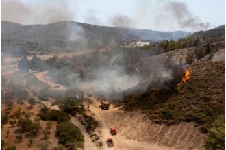 Rhodes declares emergency due to widespread wildfires.