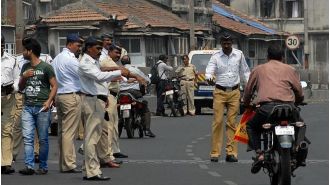Three traffic constables suspended for taking bribes from drivers breaking traffic rules.