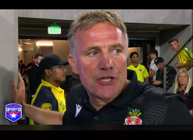 Wrexham boss warns Man U keeper to avoid future dangerous challenges after injuring Paul Mullin.