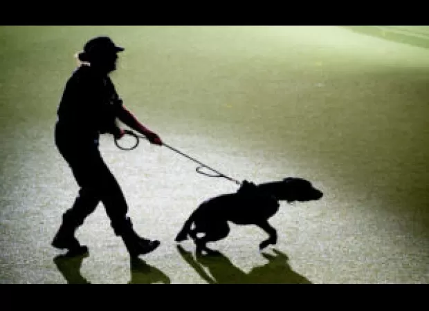 Police dog mauls Black man in Ohio after traffic stop, causing serious injury.