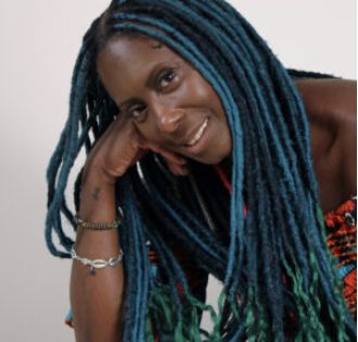 Debra Hare-Bey talks about how to wear natural hair in the workplace & celebrates 'International I Love Braids Day'.