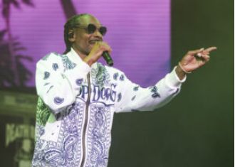 Snoop Dogg donates $10K to help a 93-year-old South Carolina woman keep her home.