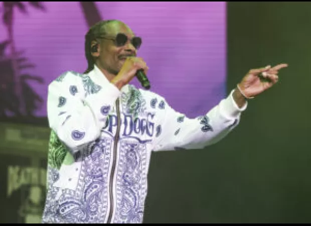 Snoop Dogg donates $10K to help a 93-year-old South Carolina woman keep her home.