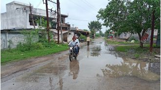 Commuters are calling for action to address the water-logged road in Takun Village.