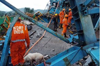 18 workers killed, several feared trapped after crane collapse.
