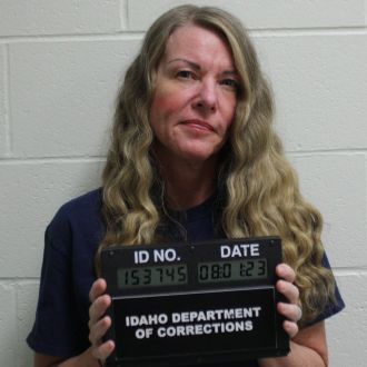 ‘Doomsday mom’ smirks in mugshot after receiving life sentence for killing her children.