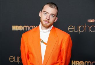 Billie Eilish pays tribute to Angus Cloud with an emotional performance in honor of his life.