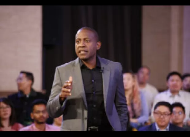 Defense team for Carlos Watson requests judge to dismiss charges of fraud, alleging racial discrimination.