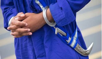 Court rules that students can wear their religious symbol, the kirpan, in schools.