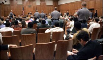 Former MS officers plead guilty to assaulting two black men out of racism.