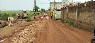 Light rain in Ganj Basoda causes potholes and pits to form on the road connecting Dharam Kanta to Kaali Pathar.