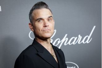 Robbie Williams seeks fillers to plump face after weight loss.
