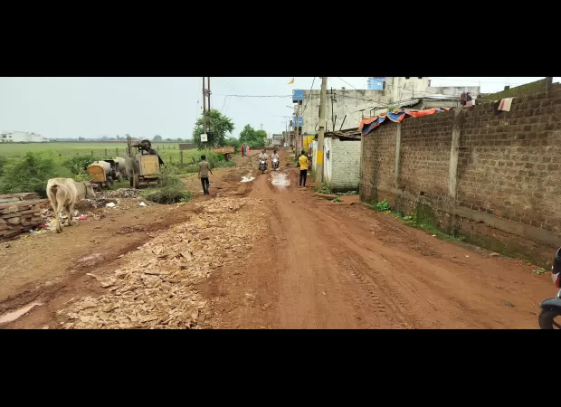 Light rain in Ganj Basoda causes potholes and pits to form on the road connecting Dharam Kanta to Kaali Pathar.
