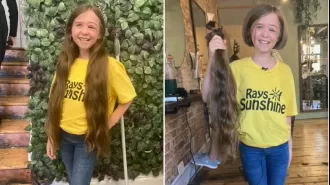 Girl gives two feet of her hair to charity in sponsored haircut.