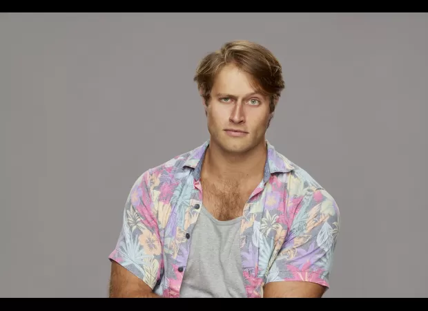 Luke Valentine removed from Big Brother show after using racial slur in public livestream.