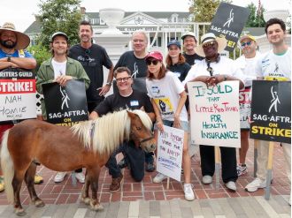 Li'l Sebastian joins in on the actors' strike for better working conditions.