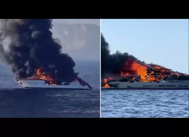 Yacht catches fire off Spanish coast, engulfed in flames.