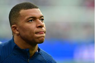 Kylian Mbappe back in PSG training after resolving issues in talks.