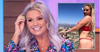 Kerry Katona flaunts her OnlyFans reign while striking a pose in bright red lingerie on a balcony.