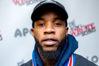 Tory Lanez criticized for releasing merch after Megan Thee Stallion shooting sentence.