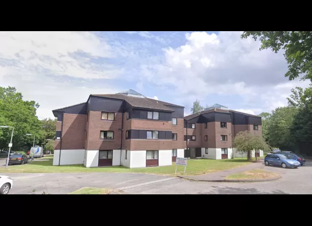 Two men arrested after a stabbing death at an apartment complex.