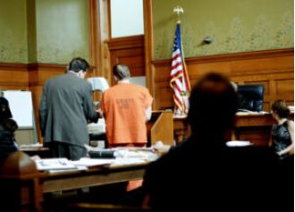 Father and son go on trial for allegedly shooting at a Black FedEx driver.