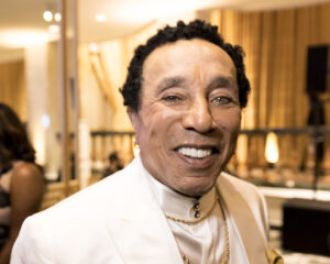 Smokey Robinson wins lawsuit against former manager for alleged breach of contract.